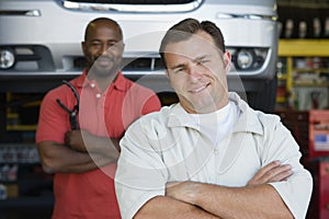 Two Men In An Auto Shop