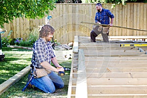 Two men building a deck photo