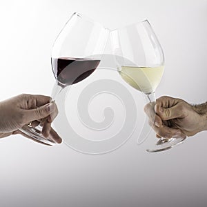 Two men celebrate with glass