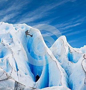 Two men climbing a glacier in patagonia.