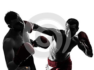 Two men exercising thai boxing silhouette