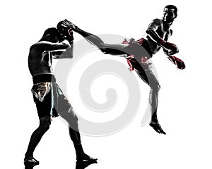 Two men exercising thai boxing silhouette