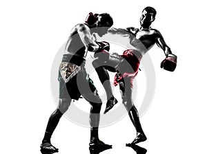 Two men exercising thai boxing silhouette
