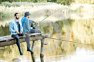 Two men fishing on the lake