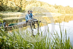 Two men fishing on the lake