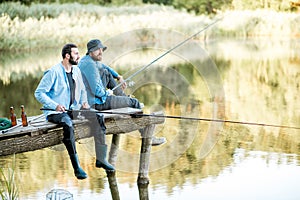 Two men fishing on the lake