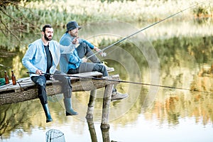 Two men fishing on the lake