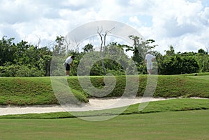 Two Men Golfing