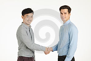 Two men in handshake pose