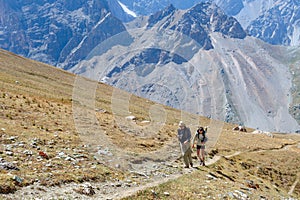 Two men hiking in Himalaya mountains