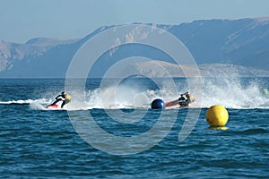 Two men on jet ski