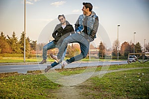 Two Men Leaping in Unison with Hands in Pockets