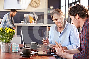 Two men meeting at a coffee shop photo