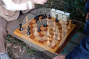 Two men play chess.