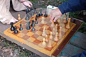 Two men play chess.