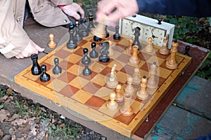 Two men play chess.