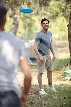two men playing frisbee