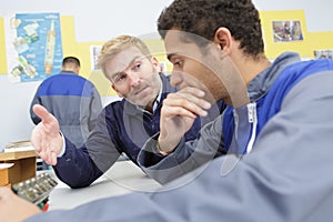 Two men in production