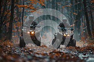 Two men riding atv quads in the forest on muddy road during a competition