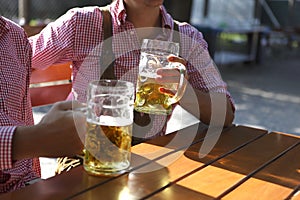 Two men sitting in a beer garden
