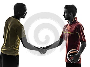 Two men soccer player handshake handshaking silhouette