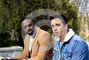 Two men talking and discussing. Afro-american and caucasian man