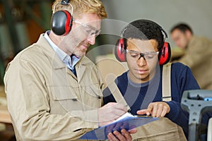 two men working in workshop