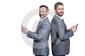 two messaging businessmen check email. businessmen reading message on phone isolated on white. business texting message