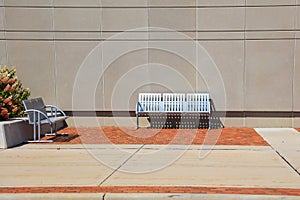 Two metal chairs in front of wall for relaxation