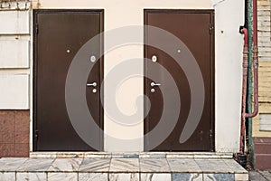 Two metal doors on facade