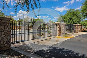 Two Metal Security Gates At Housing Subdivision