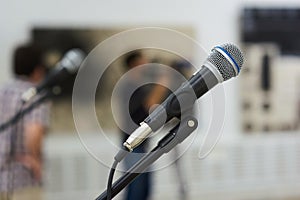 Two microphones on stage