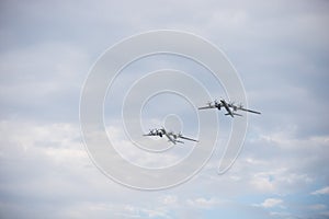 Two military long range bomber aircrafts flying in the sky