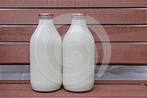 Two Milk Bottles on a Doorstep