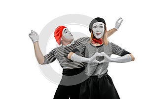 Two mimes on white background. Mime actress with excited face