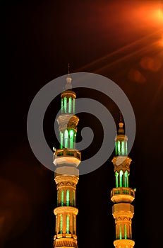 Two minarets in the night in United Arab Emirates