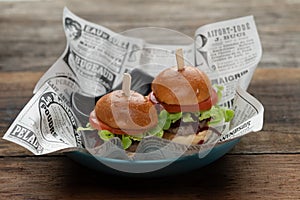 Two mini beef burgers with beetroot relish