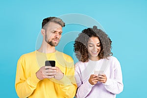 Two mixed race people on blue background