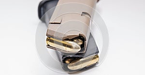 Two 9mm pistol magazines loaded with full metal jacket bullets photo