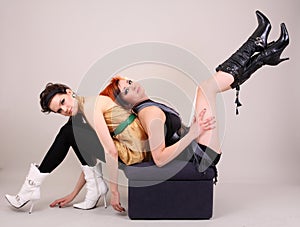 Two models in colorful setting in the studio
