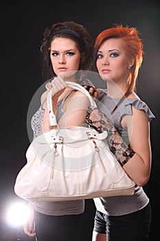 Two models in colorful setting in the studio