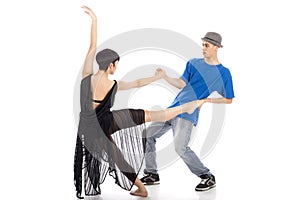 Two modern ballet dancers in dynamic action figure, on white background