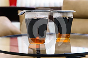 Two modern glasses of tea