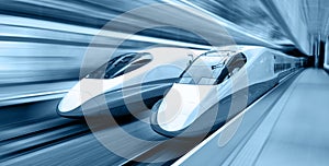 two modern train speeding