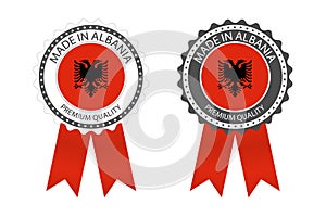 Two modern vector Made in Albania labels isolated on white background, simple stickers in Albanian colors, premium quality stamps