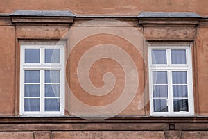 Two modern windows on the facade of the house
