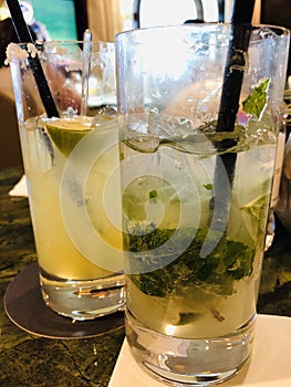 two Mojito cocktails, refreshing cool beverage for hot day