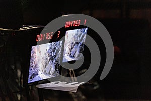 Two monitor screens in a television studio