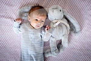 Two months old baby in bed