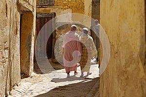 Two Moroccan women in djellabas